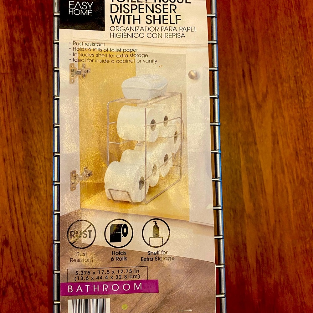 Toilet tissue dispenser, with shelf.